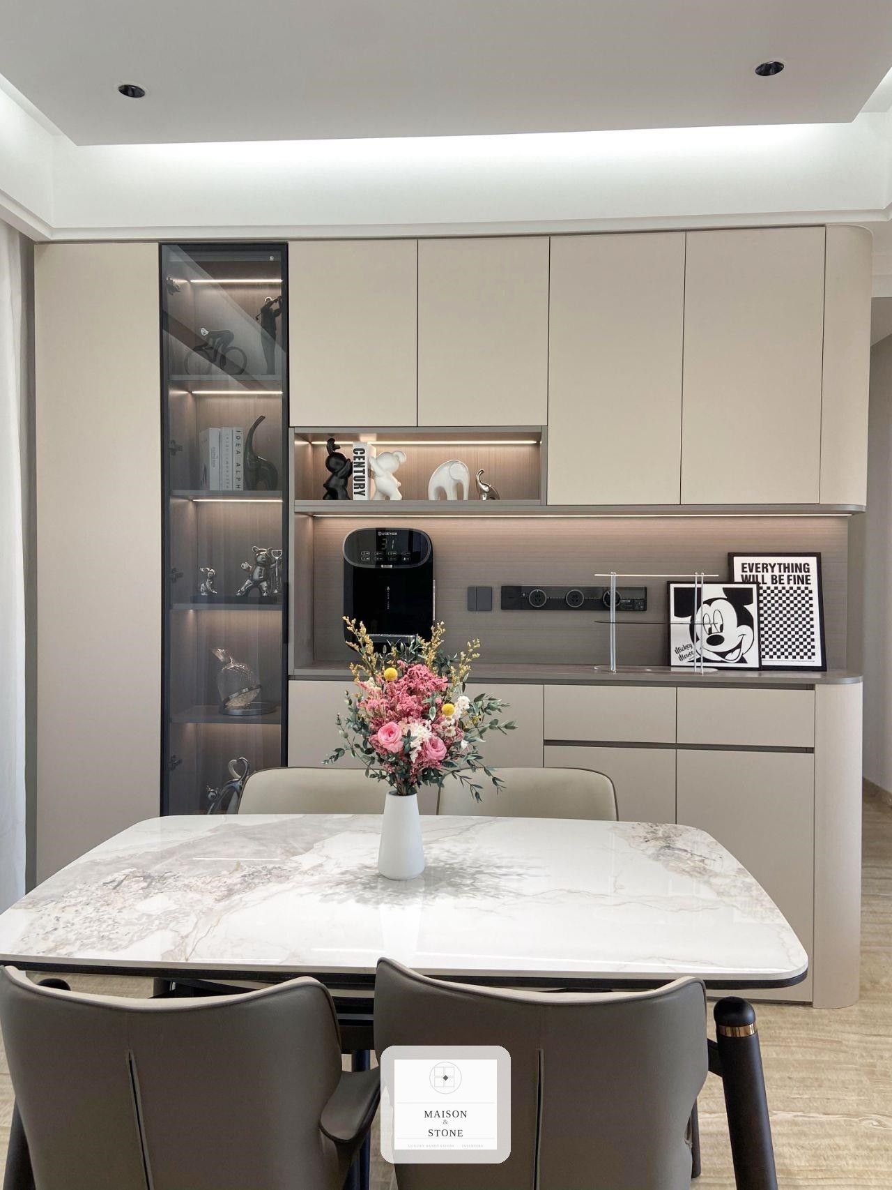 Real completed kitchen and dining renovation with curved cabinetry and marble table by Maison & Stone, Gauteng
